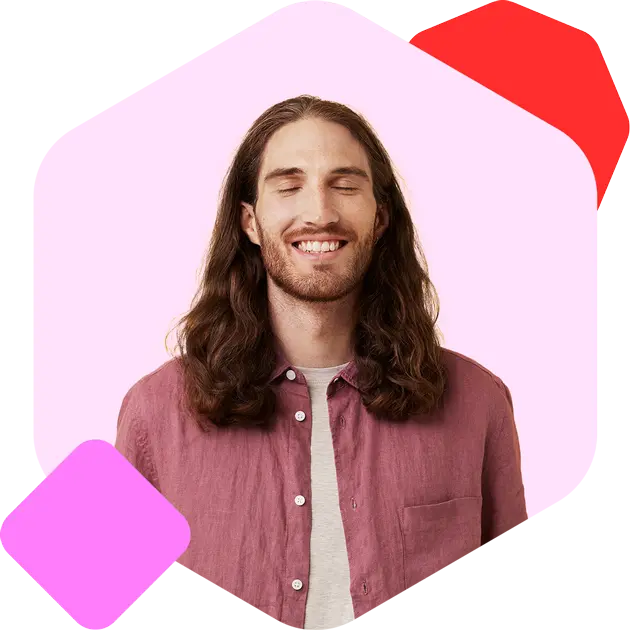 Smiling man with long hair